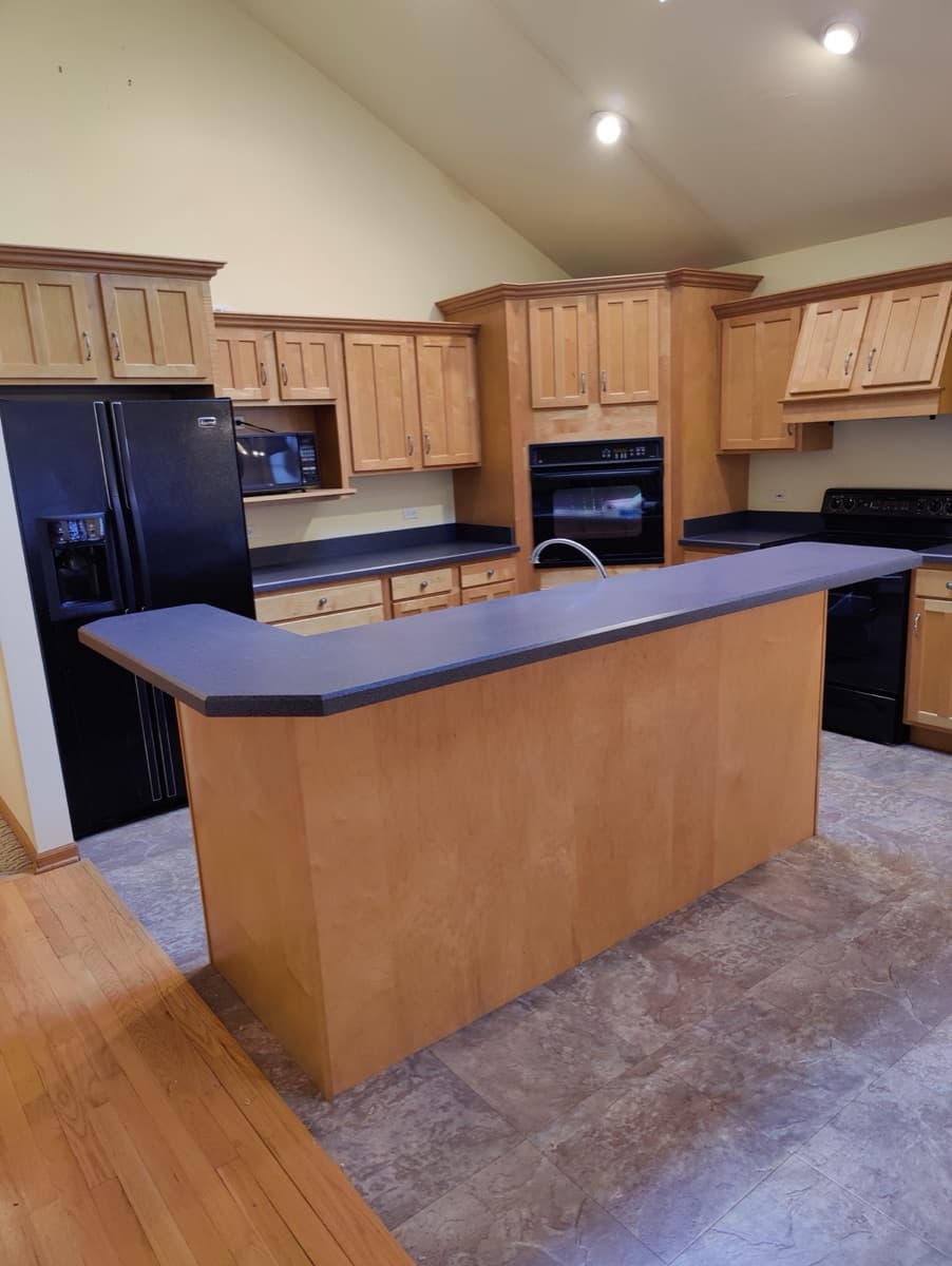 The same kitchen cleared and ready for its next chapter