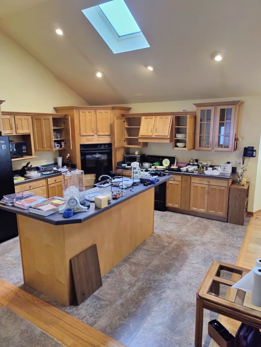 Kitchen filled with estate contents before the sale and cleanout