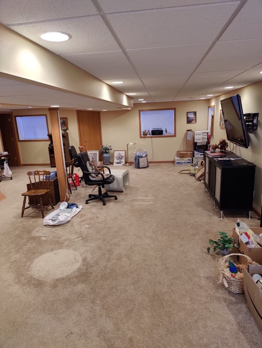 Finished lower-level room before ECOS completed the property transition